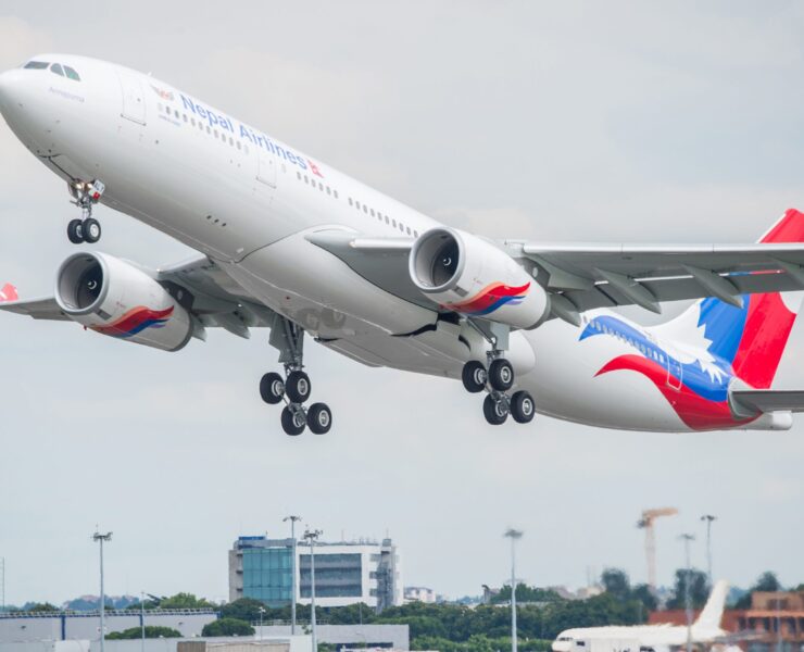 a large airplane flying in the sky