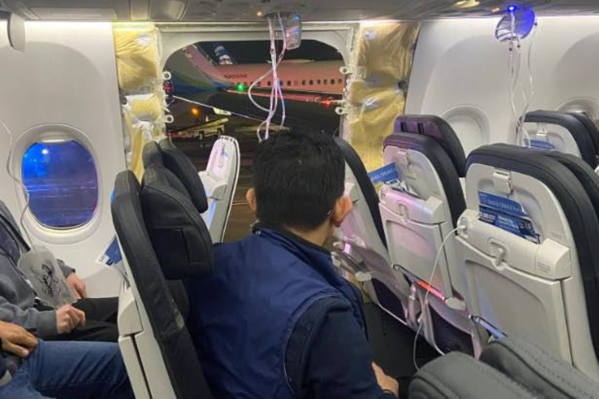 a man sitting in an airplane