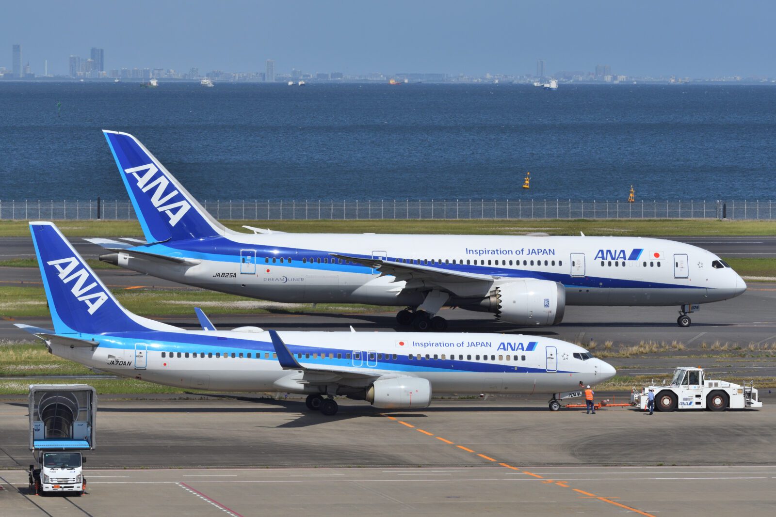 two airplanes on the runway