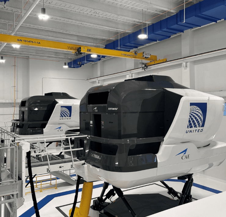 a group of white and black helicopters in a building