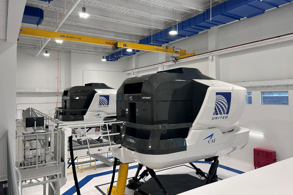 a group of white and black helicopters in a building