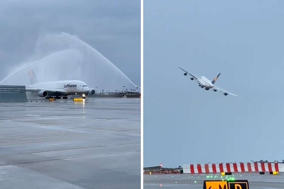 a jet plane spraying water on runway