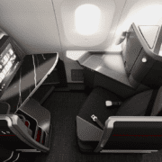 a desk and chair in an airplane