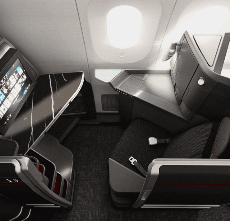 a desk and chair in an airplane