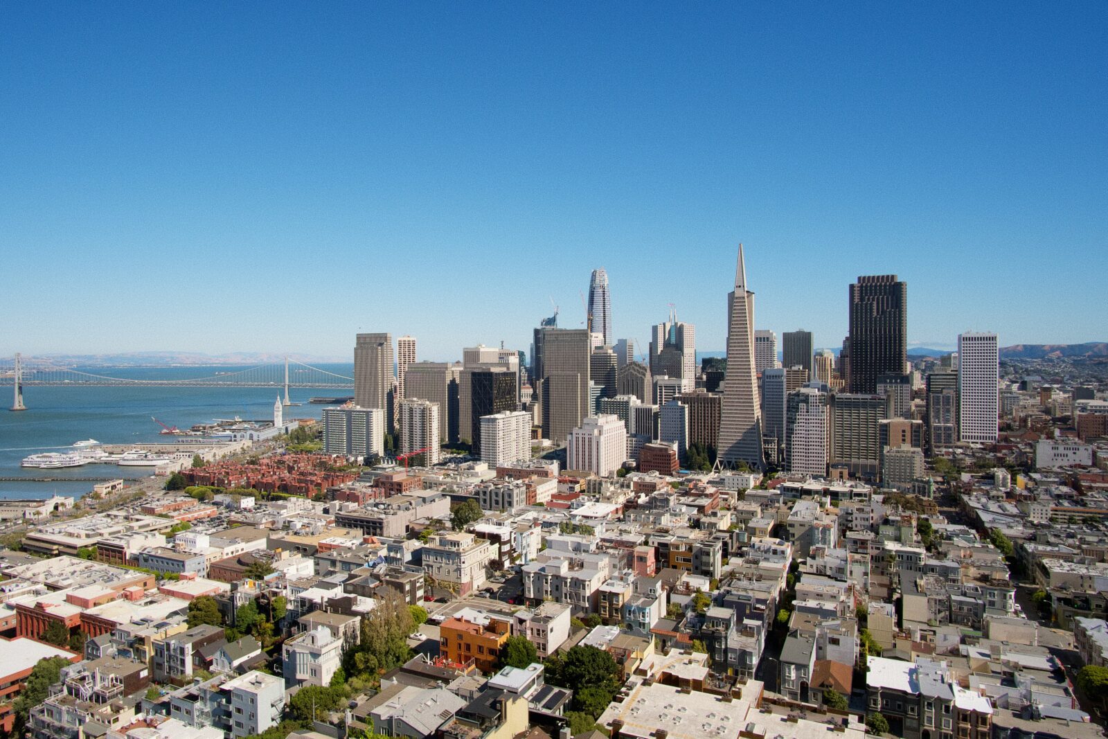 a city with many buildings and a body of water