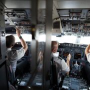 a group of men in a cockpit
