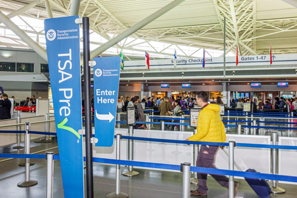 a man walking in an airport