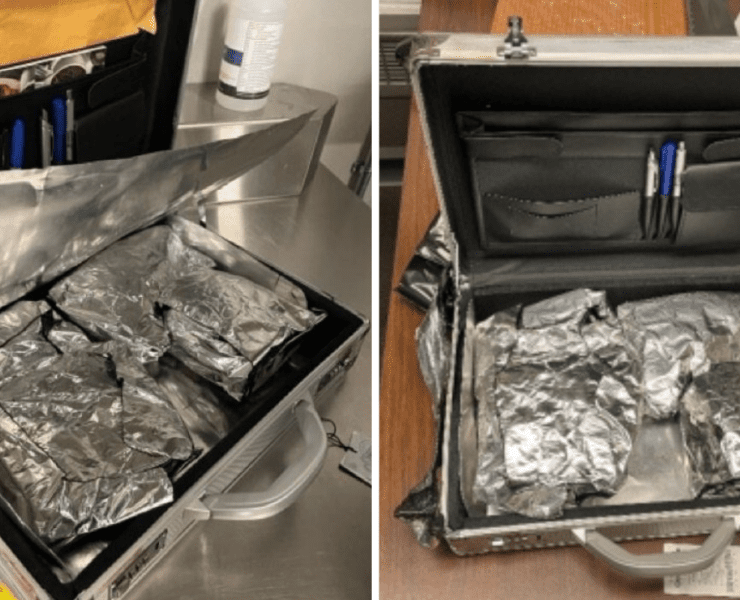 a suitcase with foil and a pen