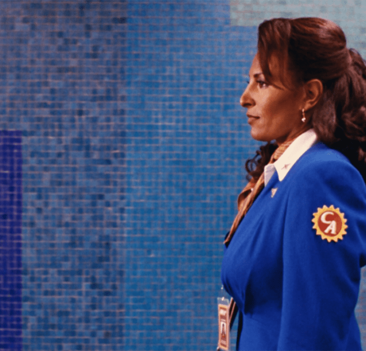 a woman in a blue suit