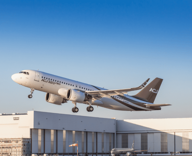 a plane flying over a building