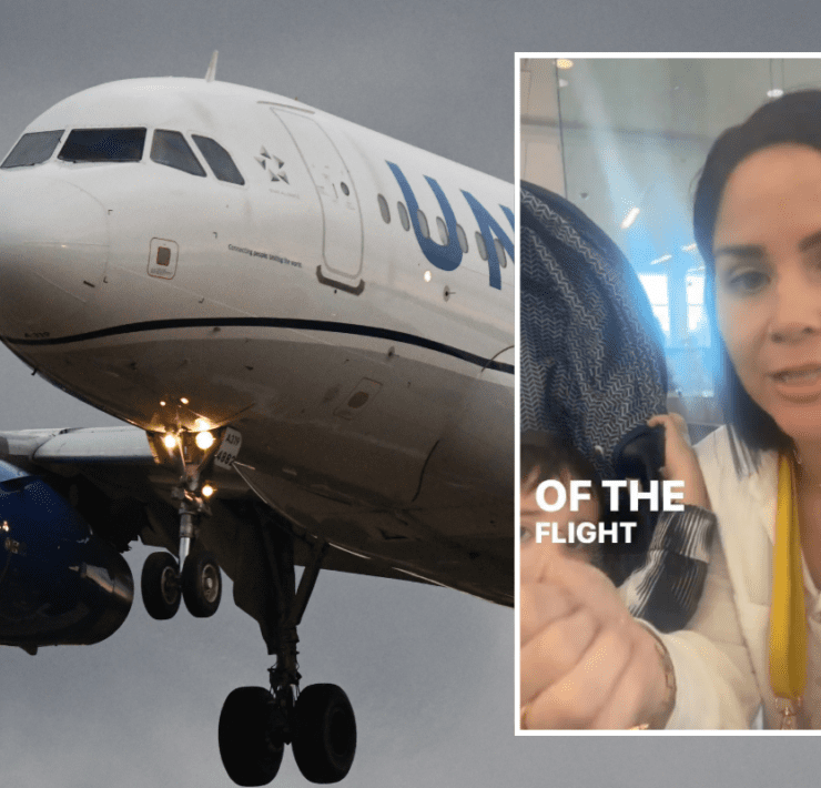 a woman in a yellow jacket and a white airplane