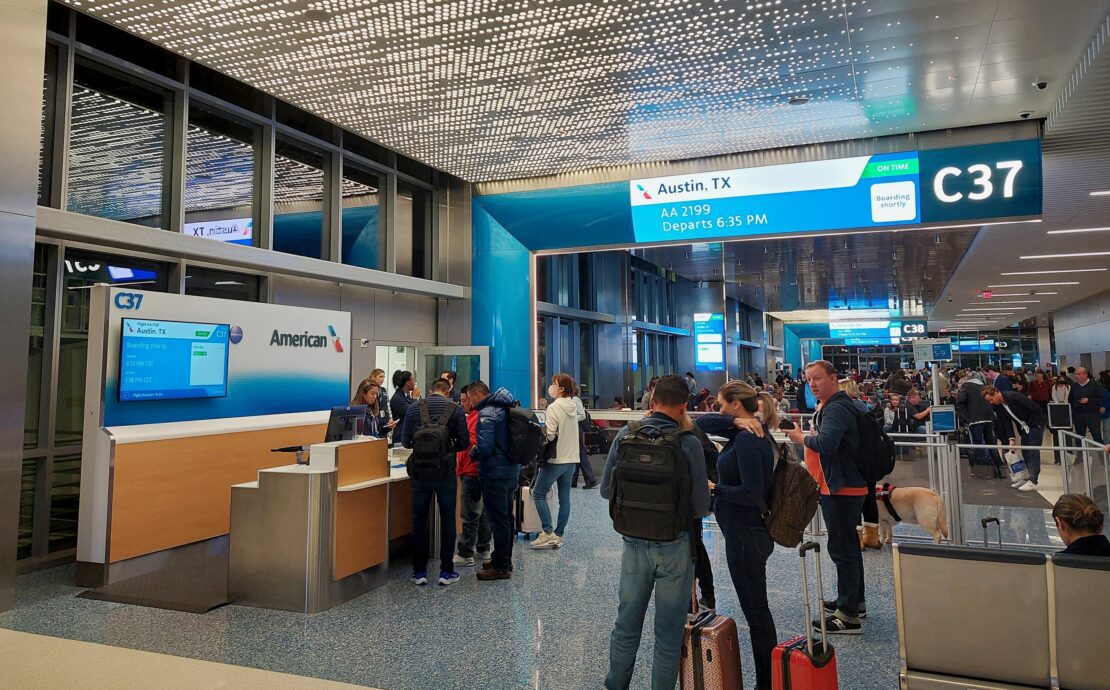 people standing in a terminal