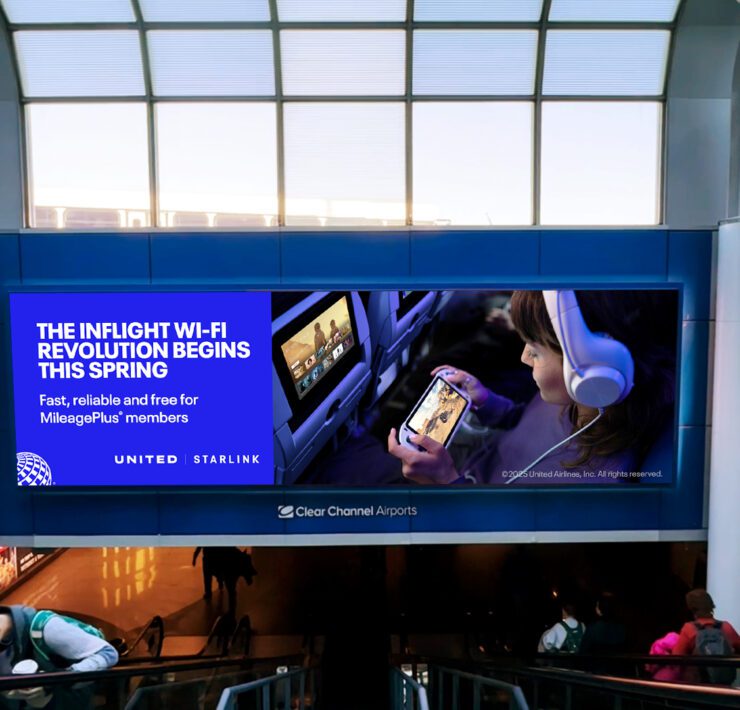 a large sign with a screen on it