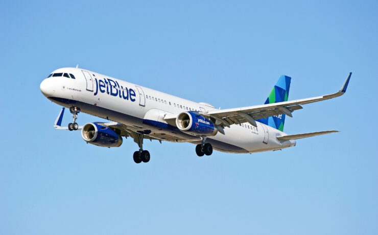 A JetBlue aircraft flying in the sky