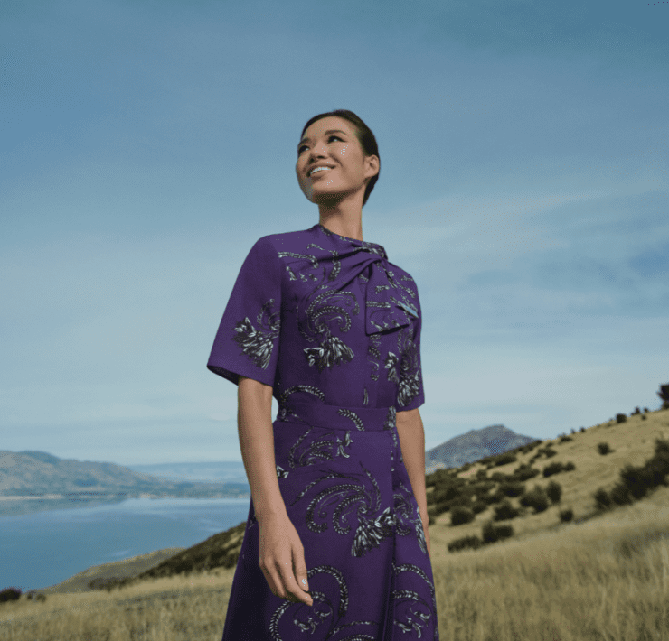 a woman in a purple dress