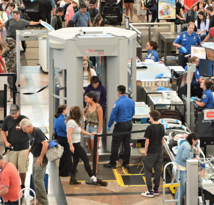 Passengers passing through a TSA checkpoint