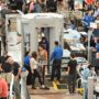Passengers passing through a TSA checkpoint