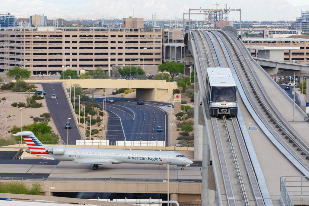 a train on a track with a plane on it