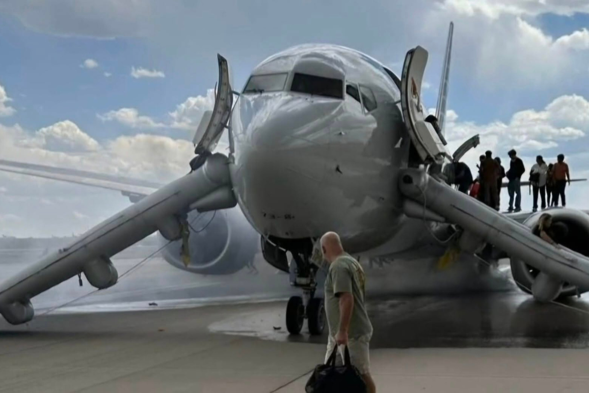 a man walking towards an airplane