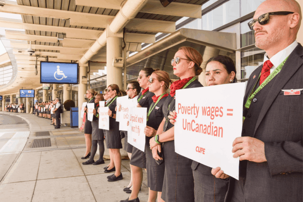 a group of people holding signs