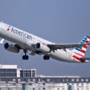 an american airlines airbus a321 flying in the sky