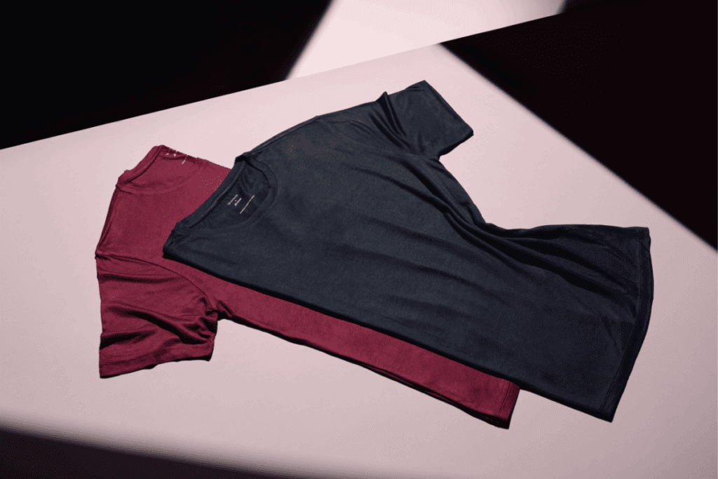 a black and red t-shirts on a table