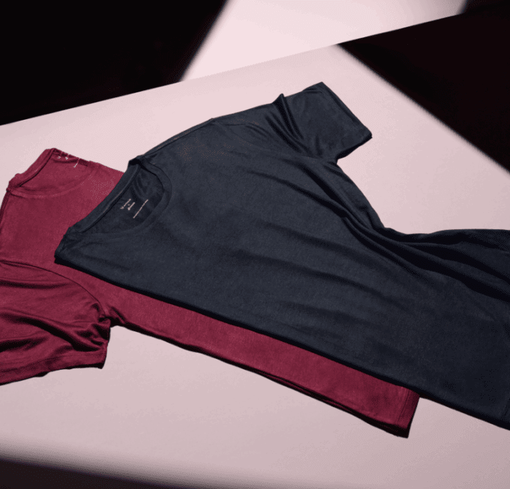 a black and red t-shirts on a table