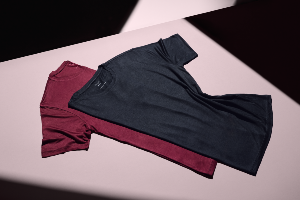 a black and red t-shirts on a table