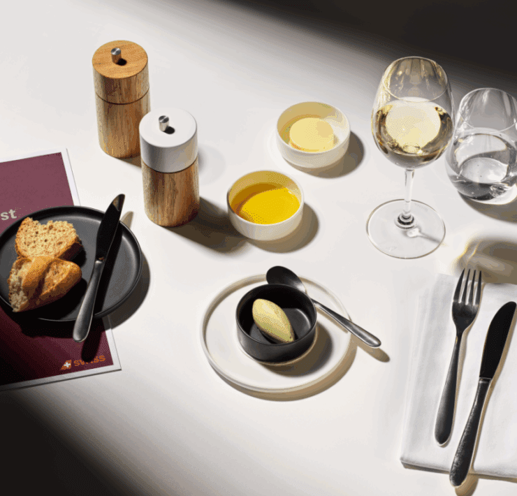 a table with food and glasses