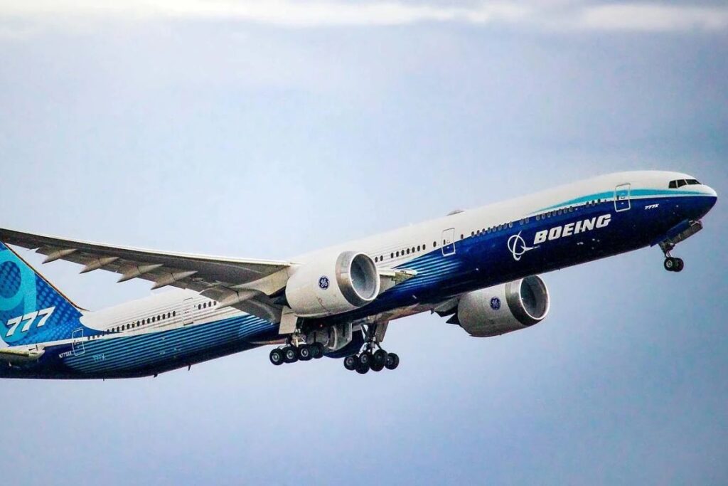 a large airplane flying in the sky