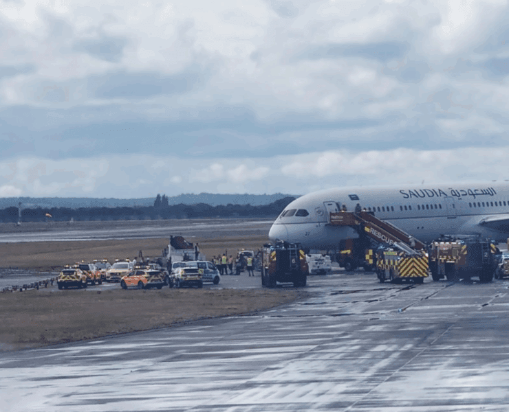 saudia boeing dreamliner emergency slide activated by unruly passenger
