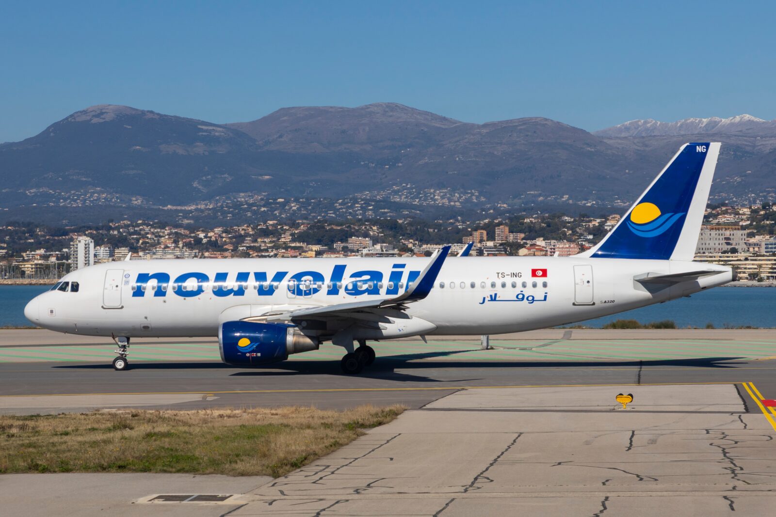 A Nouvelair airbus a320 taxiing at Nice airport in the south of france
