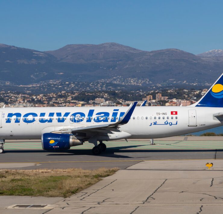 A Nouvelair airbus a320 taxiing at Nice airport in the south of france