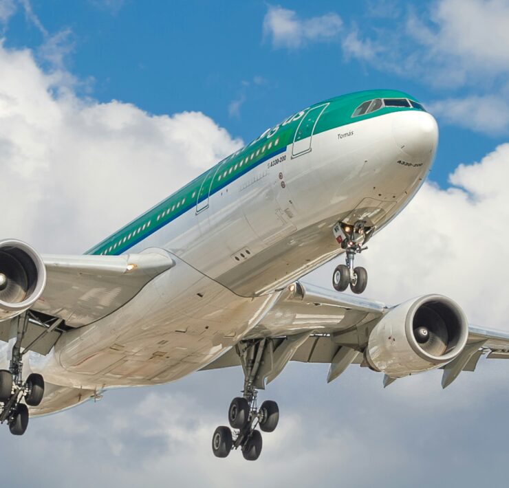 AN AER LINGUS PLANE FLYING IN THE SKY