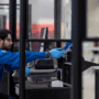 tsa agent behind a screen