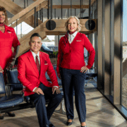 a group of people in red uniforms