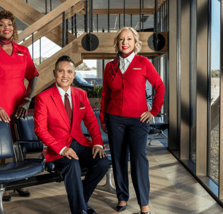 a group of people in red uniforms