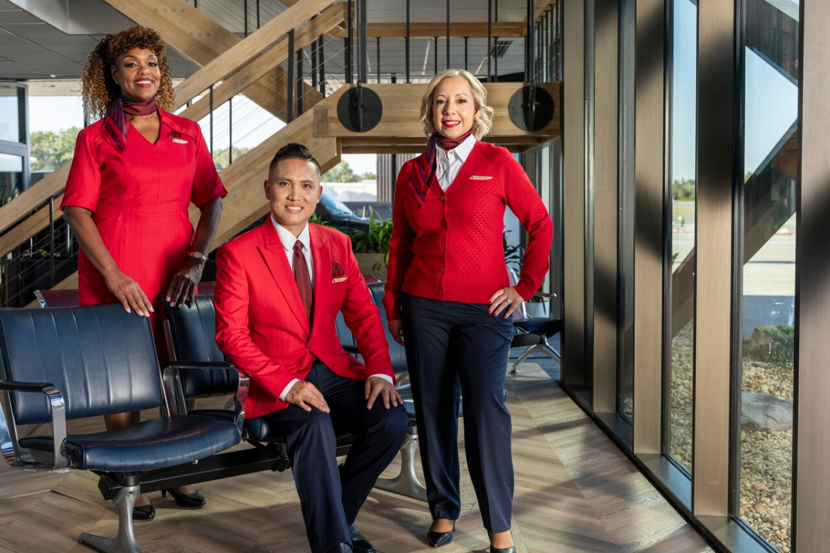 a group of people in red uniforms