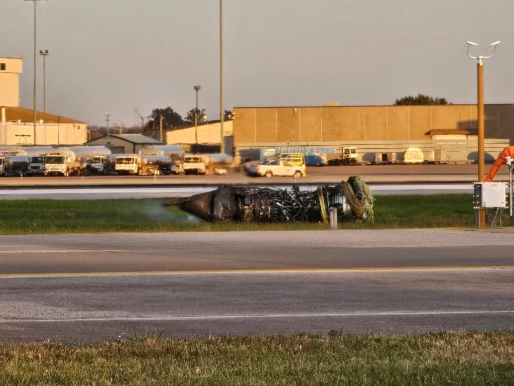 the left engine of UPS flight 2976 laying on the ground at Louisville airport