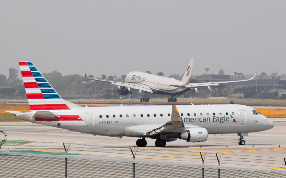 An American Airlines regional jet operated by SkyWest lining up on the runway for takeoff