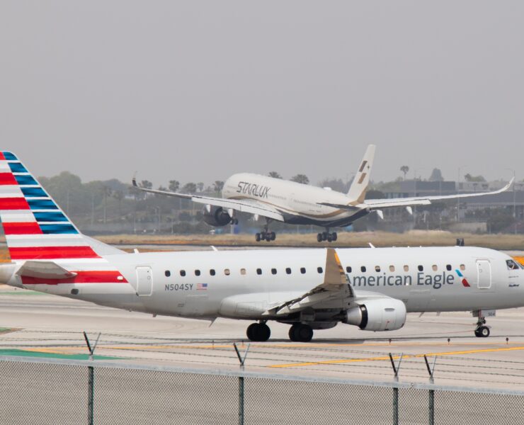 An American Airlines regional jet operated by SkyWest lining up on the runway for takeoff