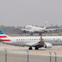 An American Airlines regional jet operated by SkyWest lining up on the runway for takeoff