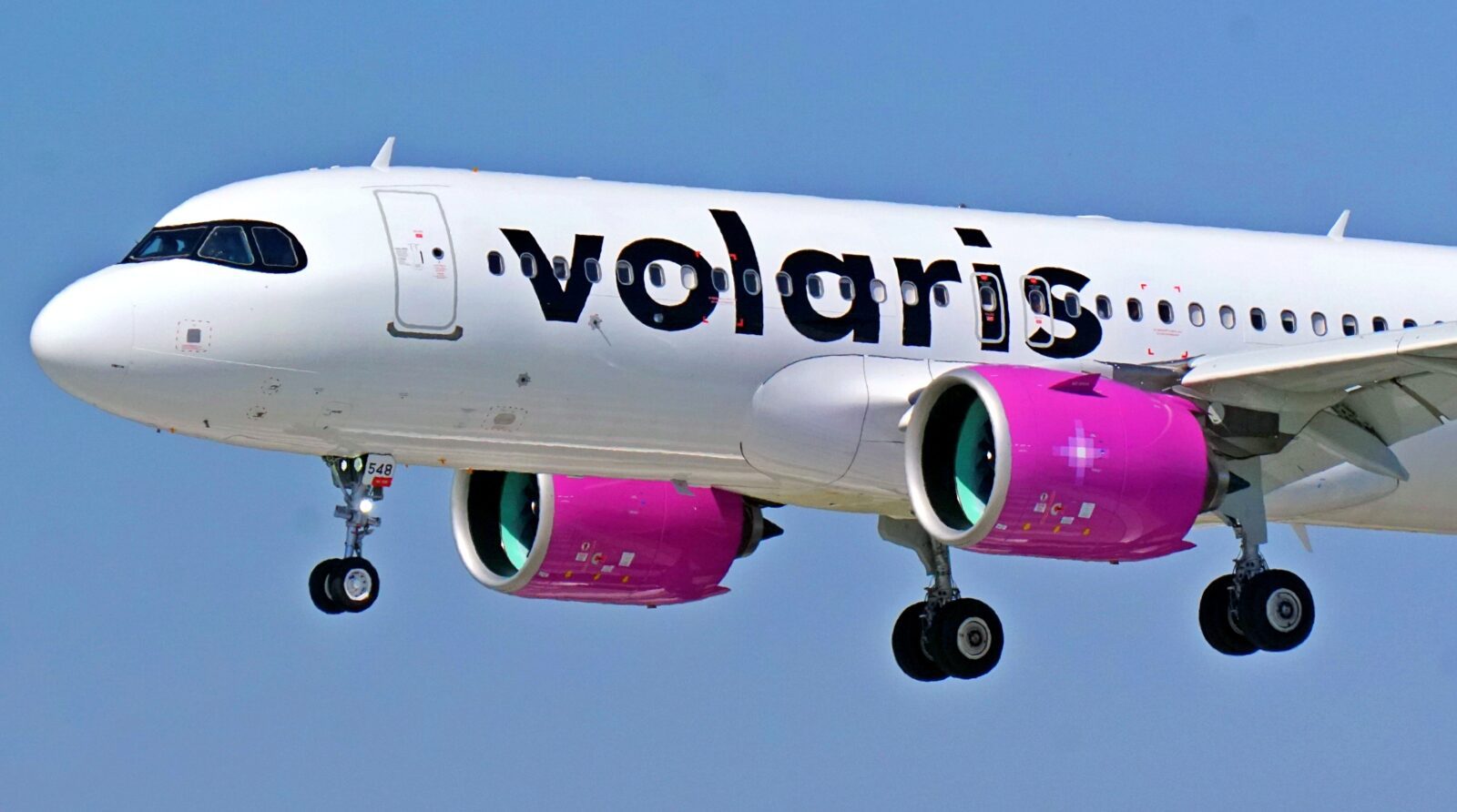a volaris a320 in the sky