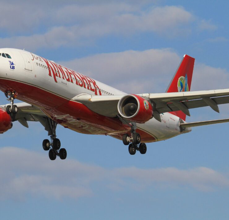 a kingfisher airlines plane flying in the sky