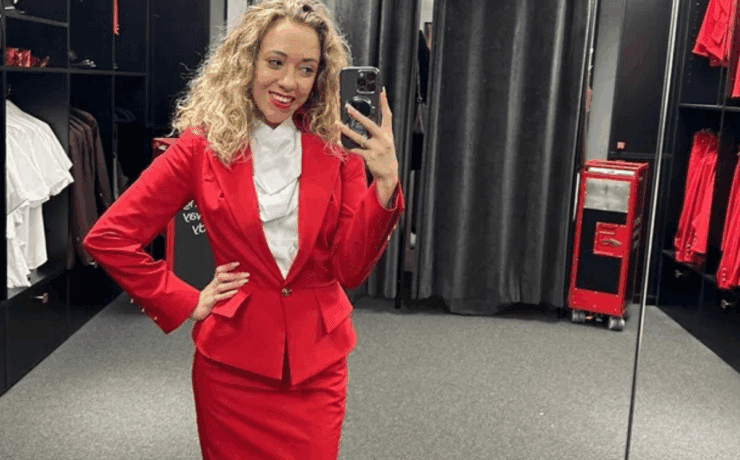 Virgin Atlantic flight attendant Jasmin Winthrop taking a selfie in her uniform
