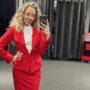 Virgin Atlantic flight attendant Jasmin Winthrop taking a selfie in her uniform