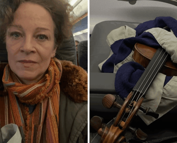 a woman taking a selfie with a violin