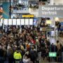 travelers at Schiphol Airport in Amsterdam face massive disruption as severe winter paralyses the airport for the fourt day running