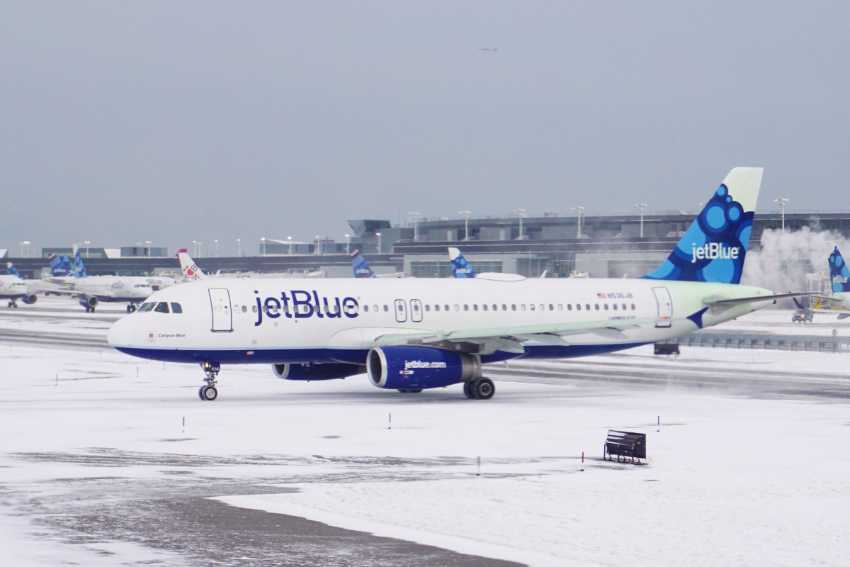 a jet plane on a runway