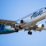 a horizon alaska airlines plane in the sky